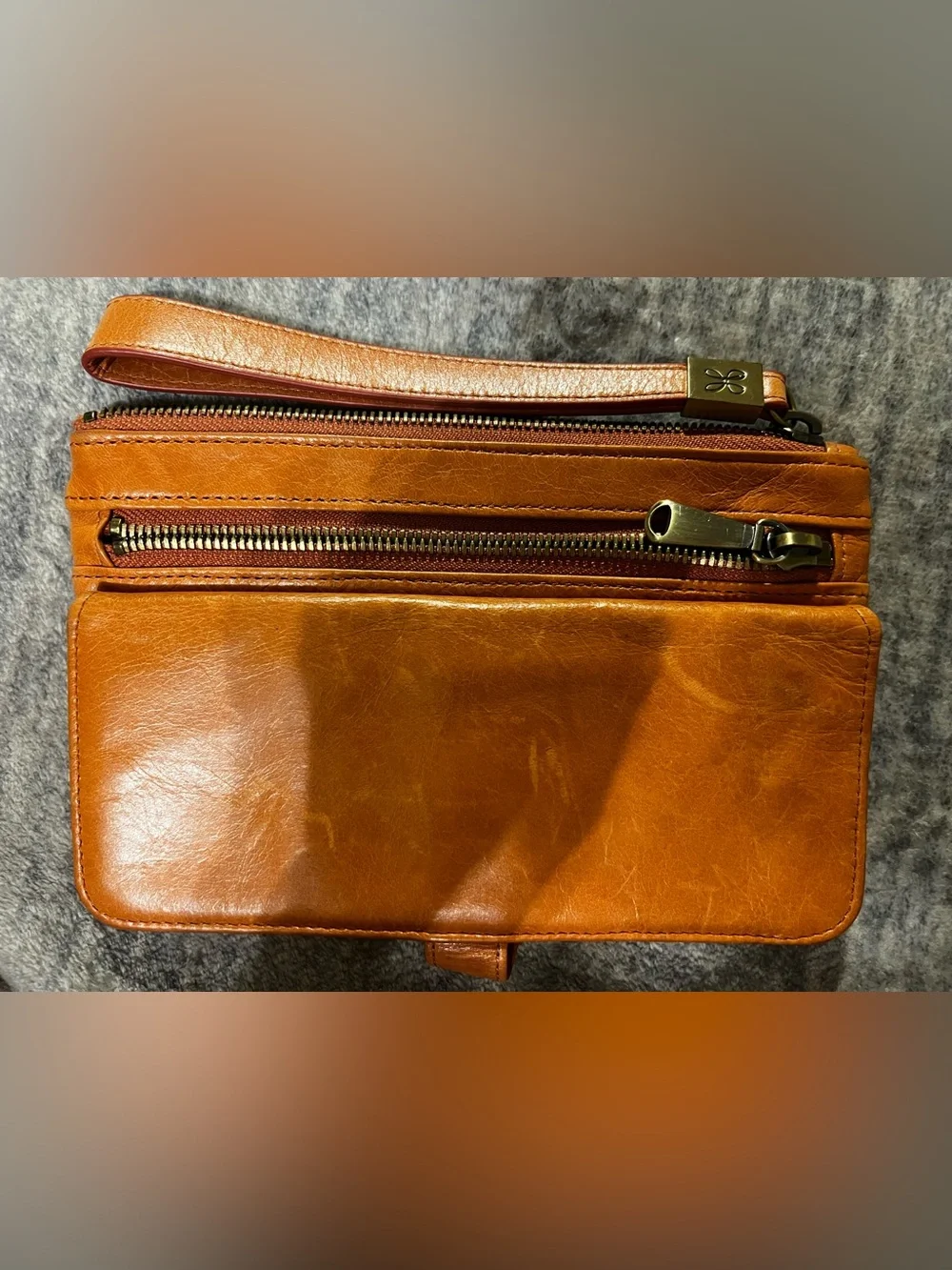 HOBO Leather Wristlet Wallet in Coral peach. 7 1/2x5